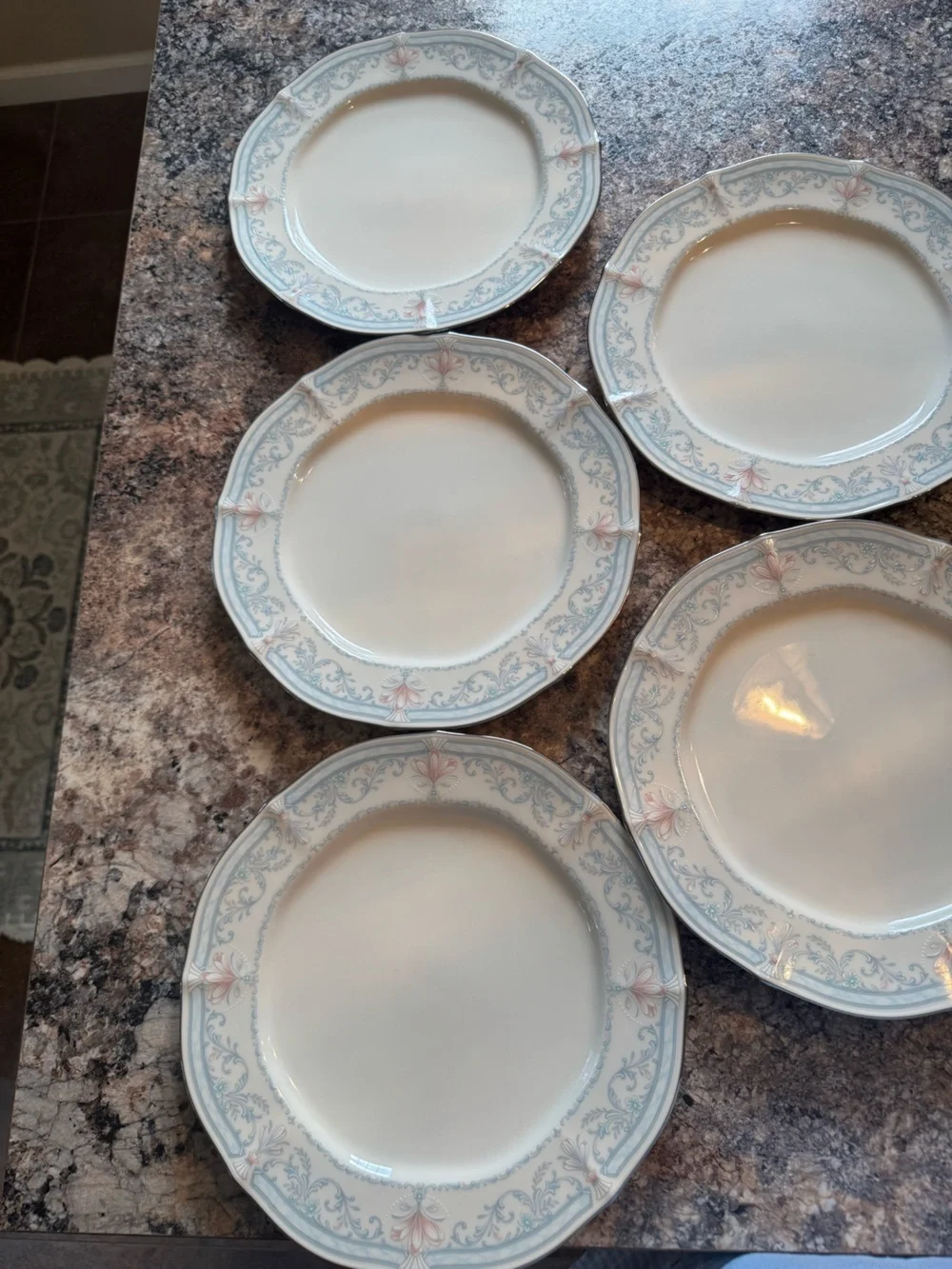 Noritake Crown Flower Dinnerware with Pale Blue and Soft Pink Floral Border